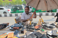 Saleh-is-running-his-leather-goods-shop-in-the-street