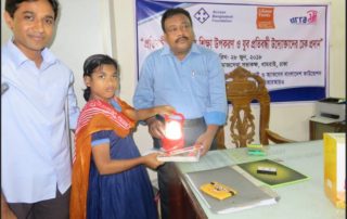 a man giving study materials to a girl